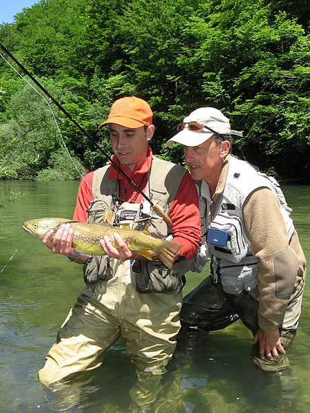 User submitted picture: Happy fisherman and his g...